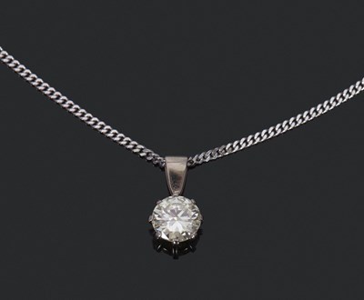 Lot 307 - A diamond solitaire pendant, the round...