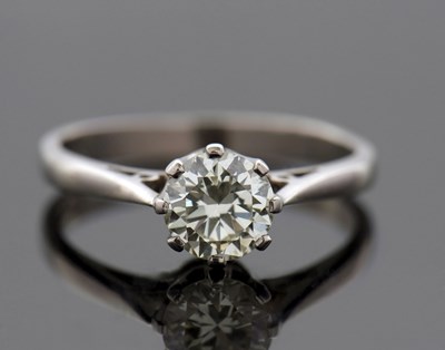 Lot 306 - An 18ct diamond solitaire ring, the round...