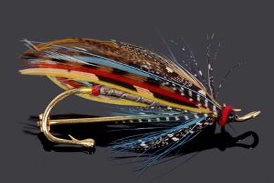 Lot 281 - A fly fishing brooch, modelled as a bi-colour...