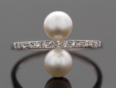 Lot 282 - A cultured pearl and diamond ring, the upper...