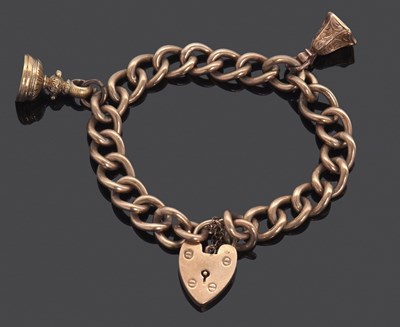 Lot 314 - A 9ct curblink bracelet and two fobs, the...