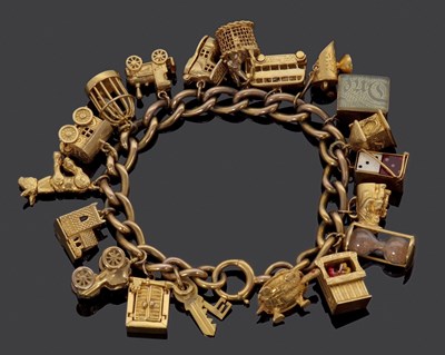 Lot 311 - A 9ct charm bracelet, the curblink bracelet,...