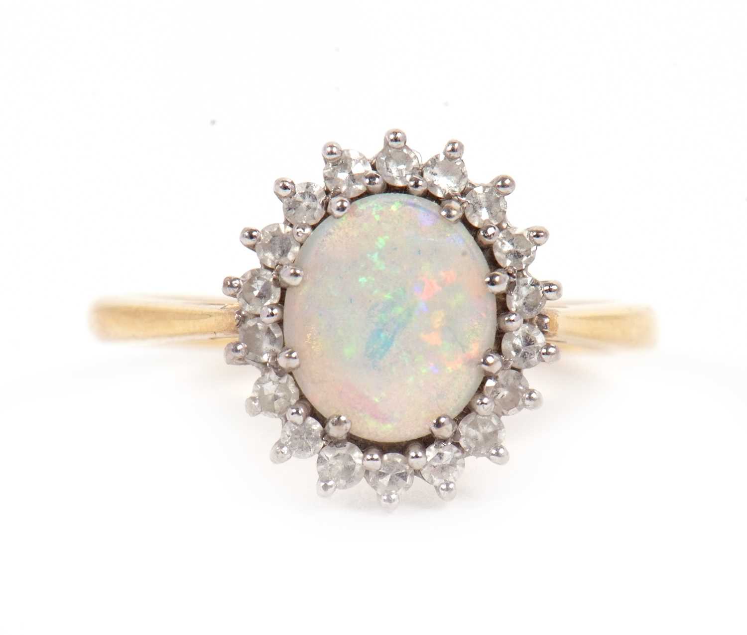 Lot 1 - An 18ct opal and diamond ring, the oval opal...