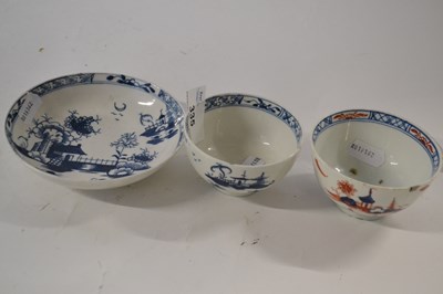 Lot 335 - A Lowestoft porcelain tea bowl and saucer in...