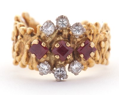 Lot 12 - A mid 20th century 18ct ruby and diamond ring,...