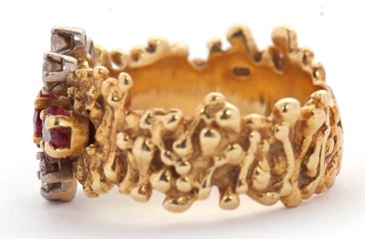 Lot 12 - A mid 20th century 18ct ruby and diamond ring,...