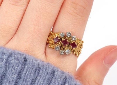 Lot 12 - A mid 20th century 18ct ruby and diamond ring,...
