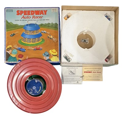 Lot 134 - A boxed reproduction tinplate Speedway Auto...