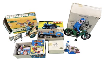 Lot 142 - A group of boxed reproduction tinplate...