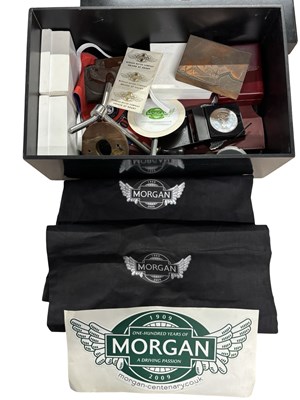 Lot 184 - MORGAN MOTOR COMPANY. Black lacquered wooden...