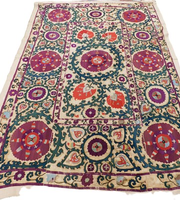 Lot 152 - A Suzani throw (adapted in to a wall hanging),...