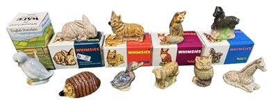 Lot 258 - A collection of boxed and loose Wade Whimsies