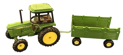 Lot 127 - An ERTL 1:32 scale John Deere  tractor and...