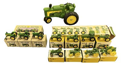 Lot 129 - An ERTL 1:32 scale John Deere Tractor,...
