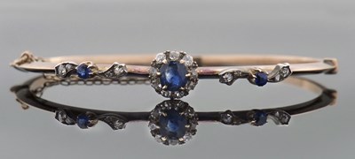 Lot 267 - A Victorian sapphire and diamond bangle, the...
