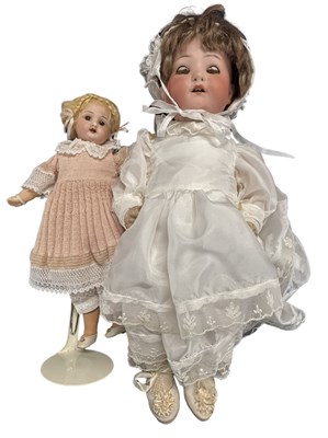 Lot 244 - A pair of Heubach Koppelsdorf bisque head...