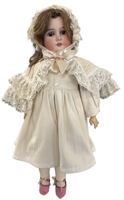 Lot 240 - An Adolf Wislizenus bisque head doll in cream...