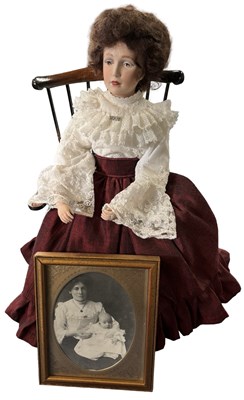 Lot 234 - An unmarked porcelain doll, Victorian lady in...