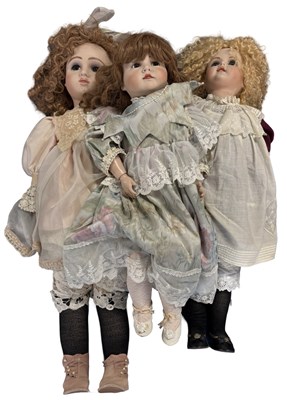 Lot 225 - A trio of large bisque head collector's dolls