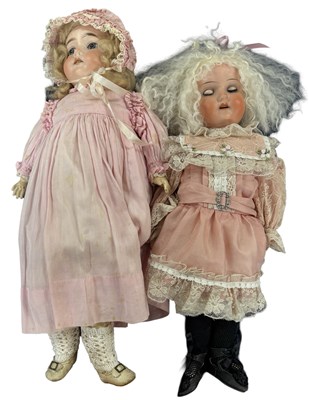 Lot 247 - A pair of German bisque head dolls, to include:...