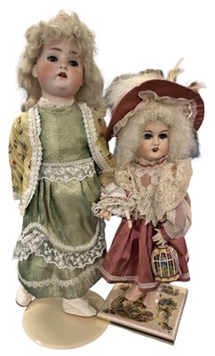 Lot 229 - A pair of continental porcelain collectors...