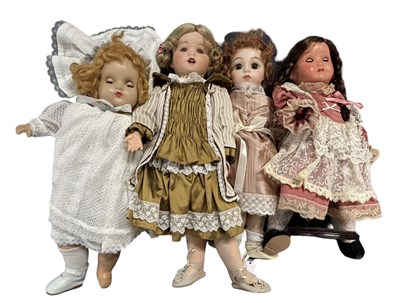 Lot 230 - A group of four various collector's dolls