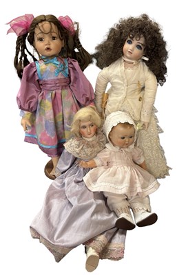 Lot 231 - A group of four various collector's dolls