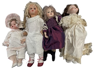 Lot 232 - A group of four various girl collector's dolls
