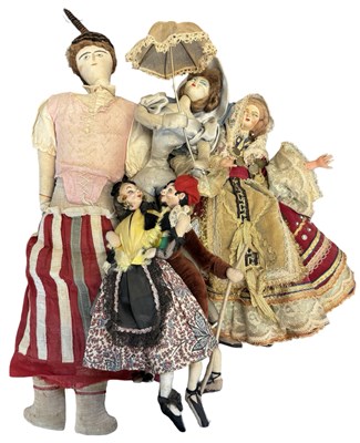 Lot 214 - A collection of 20th century cloth dolls and...