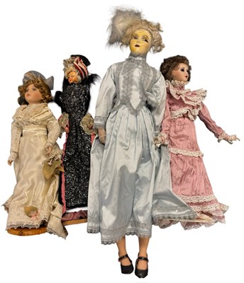 Lot 223 - A group of four various collector's dolls