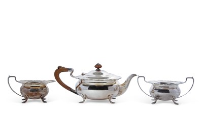 Lot 231 - A George VI silver three piece tea set of...