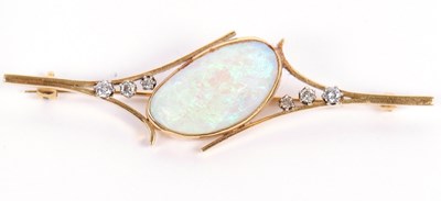 Lot 65 - An 18ct opal and diamond brooch, the collet...