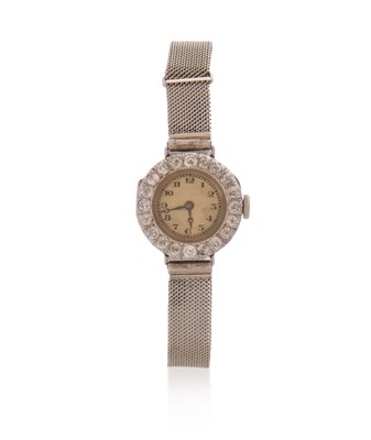 Lot 252 - An 18ct gold cased lady's watch with diamond...