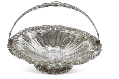Lot 201 - A Victorian silver swing handled cake basket...