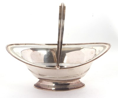 Lot 210 - An Edwardian silver swing handle basket of...