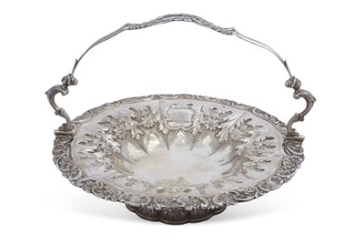 Lot 212 - An early Victorian swing handled cake basket...