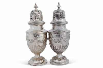 Lot 239 - A pair of large late Victorian silver casters...