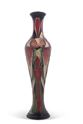Lot 52 - A Moorcroft vase with tubelined floral design,...