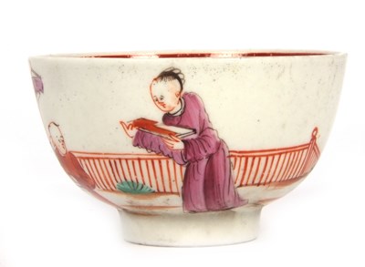 Lot 57 - A Lowestoft porcelain tea bowl and saucer with...