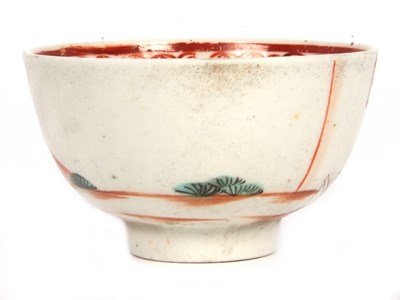 Lot 57 - A Lowestoft porcelain tea bowl and saucer with...