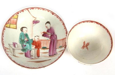 Lot 57 - A Lowestoft porcelain tea bowl and saucer with...