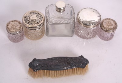 Lot 59 - A group of five glass dressing table...