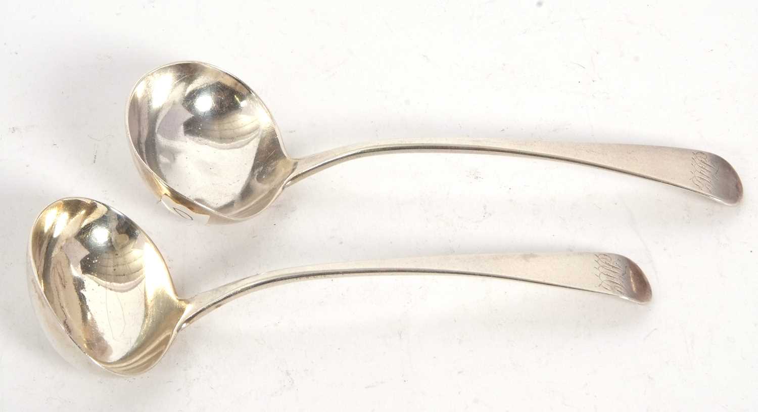 Lot 72 - A pair of George III silver ladles, Old...