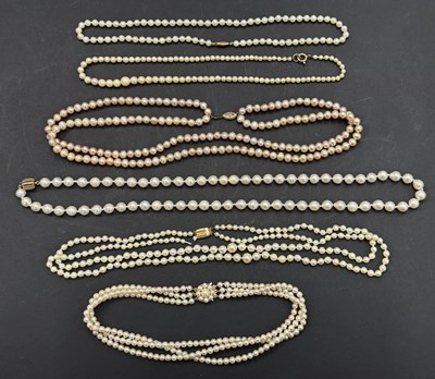 Lot 225 - A quantity of cultured pearls with gold clasps:...
