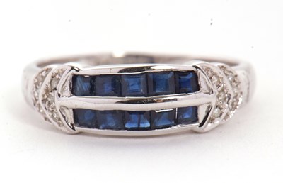 Lot 39 - A 9ct white gold sapphire and diamond ring,...