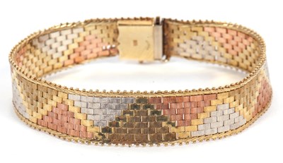 Lot 158 - A 9ct tri-colour gold bracelet, 13mm wide,...