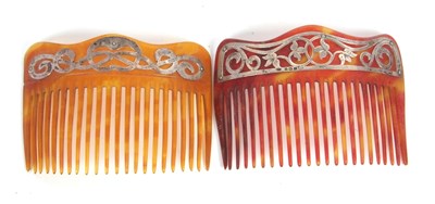 Lot 215 - Two silver mounted hair combs, one hallmarked...