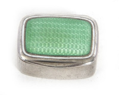 Lot 120 - A 925 marked pill box with a green guilloche...