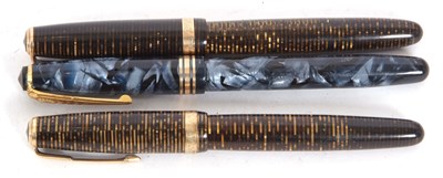 Lot 150 - Three early 20th Century fountain pens, two...