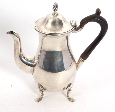 Lot 165 - A late Victorian small silver hot water jug of...
